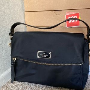 Brand new Kate Spade bag. Can be carried of the cross body or purse.